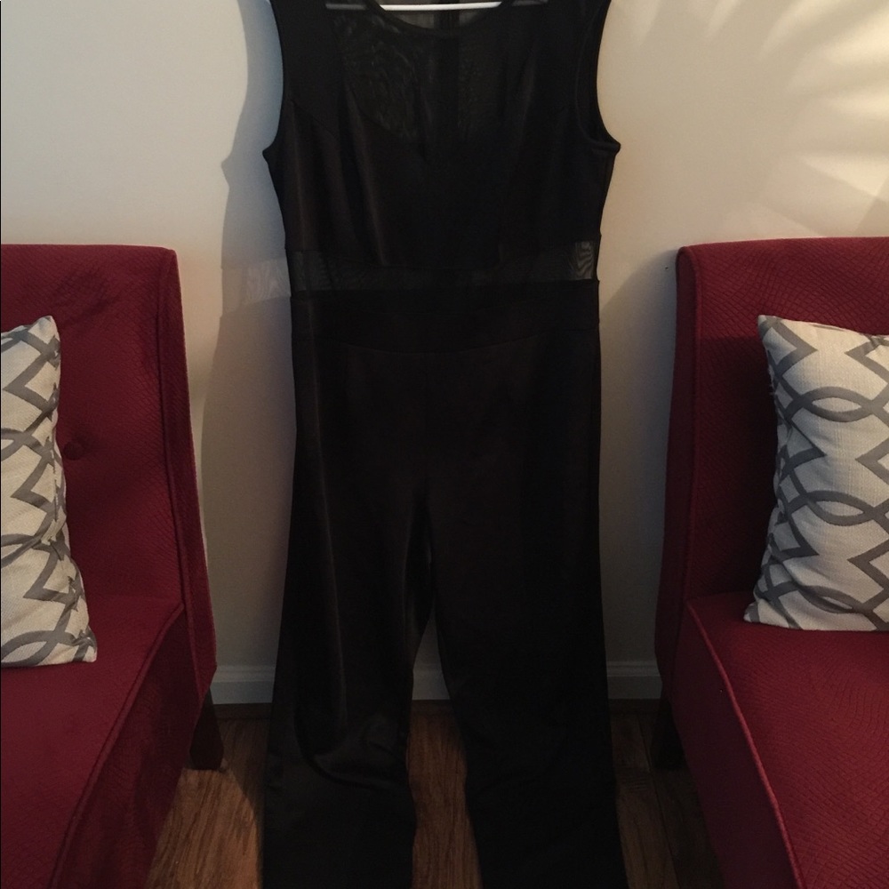 Brand new all black and sheer jumpsuit